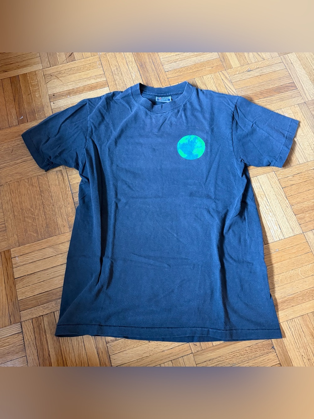 Black Graphic Crewneck T‑Shirt with Small Green Globe Print